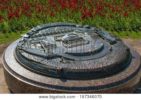 St. Petersburg, Russia - April 3, 2016: The memorial sign -Spit of Vasilyevsky Island- with some coins.