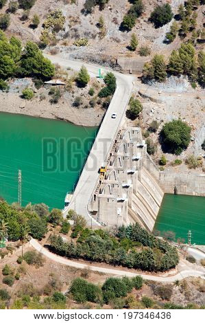 Aerial view at Hydroelectric power station and dum with car on it