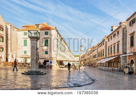 Orlando Column On Stradun Street And People Old City Dubrovnik