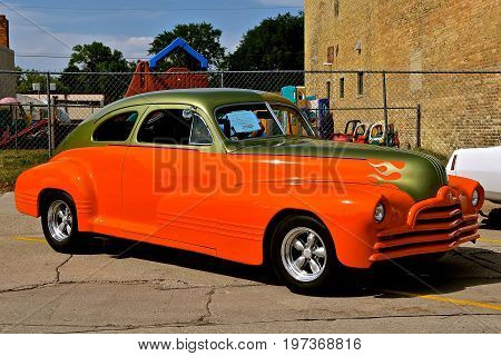 CASSELTON, NORTH DAKOTA, July 27, 2017: The annual Casselton Car Show which occurs the last Thursday of July features classic vehicles such as the 1947 Streamliner Pontiac.