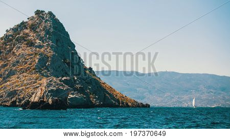 Coastal cliffs in the Aegean sea, Greek Islands.