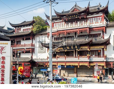 Shanghai, China - Nov 6, 2016: Building with faithfully restored traditional Chinese architecture along Fangbang Middle Road - Old Shanghai view.