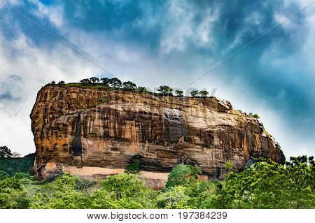 Sigiriya or Sinhagiri Lion Rock an ancient rock fortress located in the northern Matale District near the town of Dambulla in the Central Province Sri Lanka.