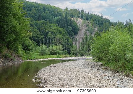 River Schodnica between Carpathians mountains in Ukraine