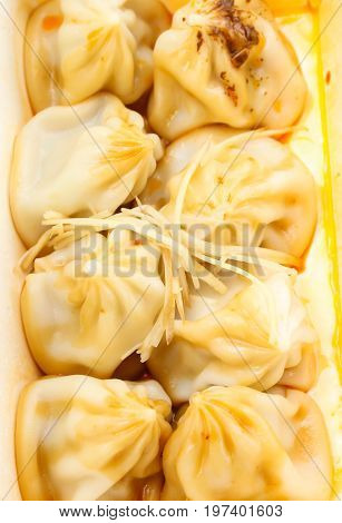 Closeup of Xiao Long Pao and ginger slide