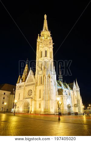 Beautiful Church Of St. Matthias With Night Illumination. Budapest