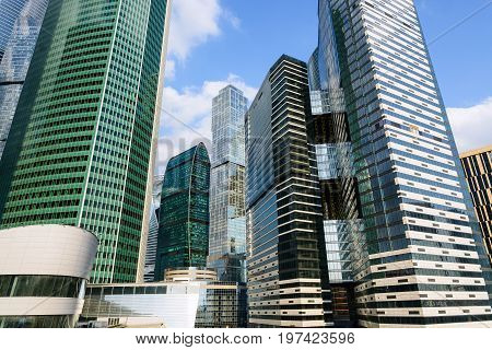 Modern glass hi-rise buildings skyscraper in financial district of the city.