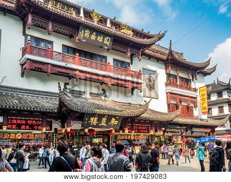Shanghai, China - Nov 6, 2016: Old Shanghai Street - old residential buildings with architectural structures faithfully restored to the traditional Chinese styling and converted into modern-day commercial stores.