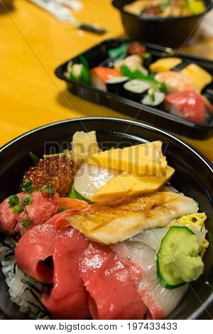 Sashimi Rice Bowl (Kaisen Don) with tuna tamagoyaki and ikura Japanese famous food