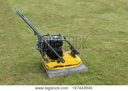 A Flat Plate Vibratory Compactor Construction Tool.