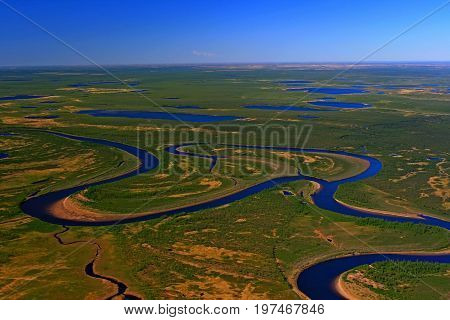 The Taimyr tundra in the spring. Photo from a helicopter. Siberia Russia.
