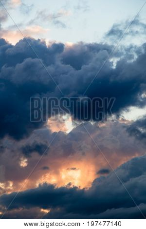 magical sky with smoky stratocumulus clouds at sunset