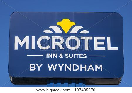 Indianapolis - Circa July 2017: Signage of Microtel Inn and Suites. Microtel is a subsidiary of Wyndham Worldwide I