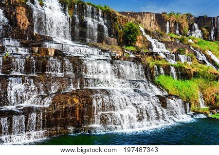 Beautiful Natural Cascades Of Waterfall With Crystal Clear Water