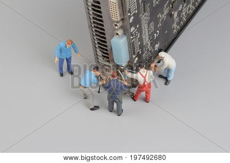 Computer Repairs Concept With Mini Figures And Components