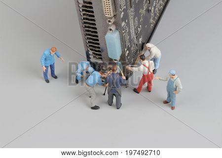 Computer Repairs Concept With Mini Figures And Components