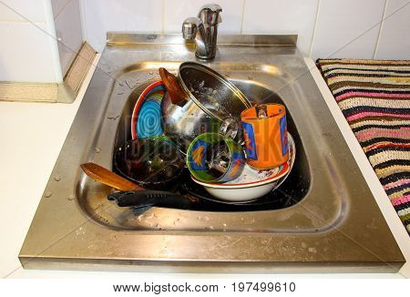 Dirty Dishes In The Sink, In The Kitchen