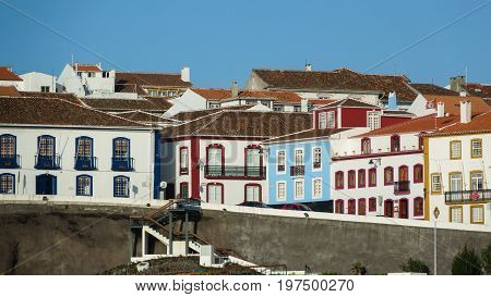 Long shot of colorful houses in the port and the city Angra do Heroismo, Terceira island, Azores islands. Good for postcards