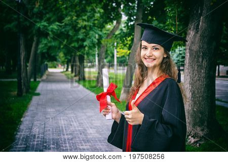 Woman portrait on her graduation day. University. Education graduation and people concept.