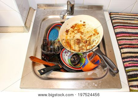 Dirty Dishes In The Sink, In The Kitchen