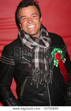 LOS ANGELES - NOV 28:  Michel Maloney arrives at the 2010 Hollywood Christmas Parade at Hollywood Boulevard on November 28, 2010 in Los Angeles, CA