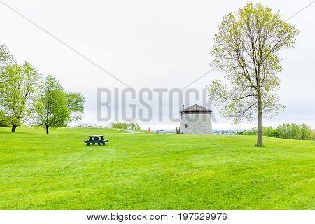 Quebec City Canada - May 30 2017: Martello tower watchtower in plaines d'Abraham with green grass field
