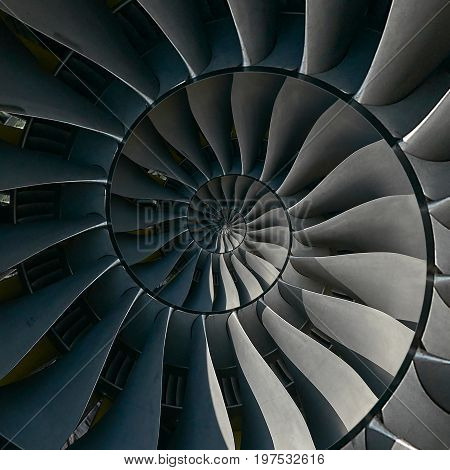 Turbine blades wings spiral effect abstract fractal pattern background. Spiral industrial production metallic turbine background. Turbine manufacturing technology abstract fractal pattern stair