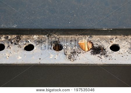 Cigarettes In Metal Outdoors Ashtray