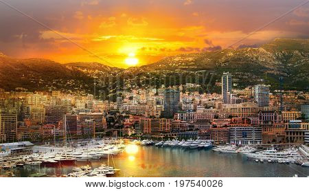 Monaco at sunset. Main marina of Monte Carlo with luxury yachts and sail boats at sunset