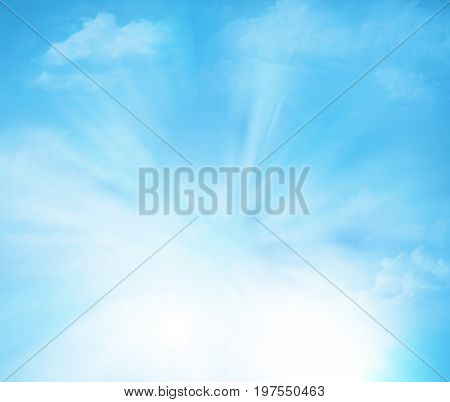 Sky background with clouds and rays of light