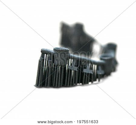 Object denture body printed on a laser sintering machine. Isolated on white background. Close-up.
