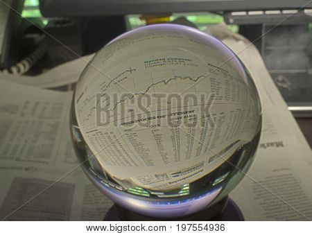HDR Photo image of stock market graph through a crystal ball