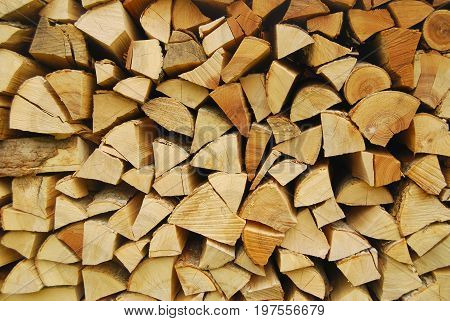 Firewood stacked for winter - firewood background