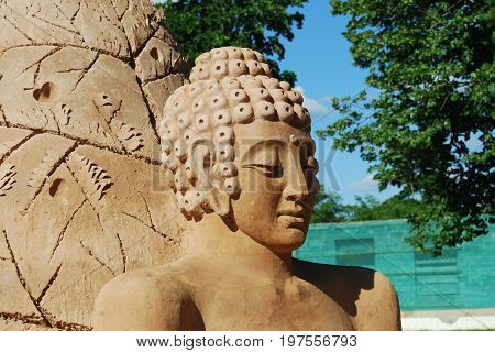 Sand Sculpture of Buddha meditating in peace