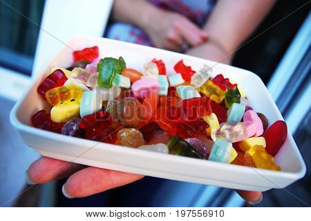 Bowl of gummy bears and other sweets (candy)