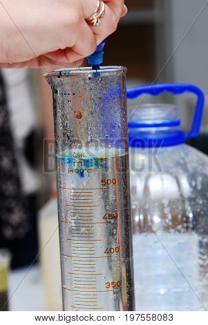 Transparent & Blue coloured chemistry process substance