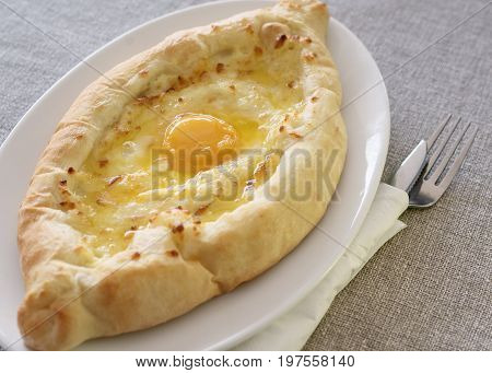 Adjarian khachapuri forms boats Georgian cuisine food