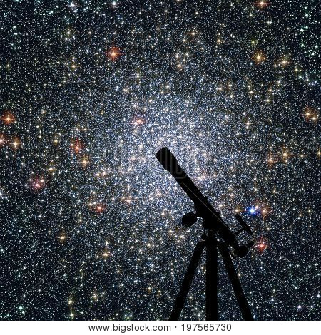 Space Background With Silhouette Of Telescope. Globular Cluster 47 Tucanae,  Ngc 104  In The Constel