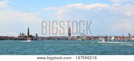 Bell Tower Of Saint Mark And The Church Of Saint George  In Veni