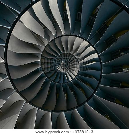 Turbine blades wings spiral effect abstract fractal pattern background. Spiral industrial production metallic turbine background. Turbine manufacturing technology abstract fractal pattern staircase