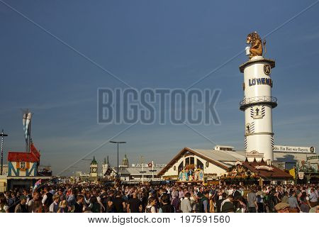 Munich, Germany - September 24, 2016: Loewenbraeu beer tent with unidentified people on the main street