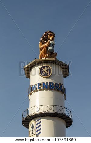 Munich, Germany - September 24, 2016: Famous tower of the Loewenbraeu beer tent with the lion sculpture on top