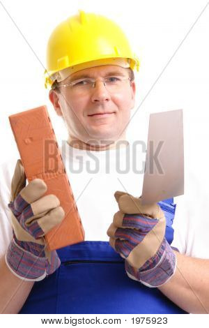 Builder avec briques et truelle