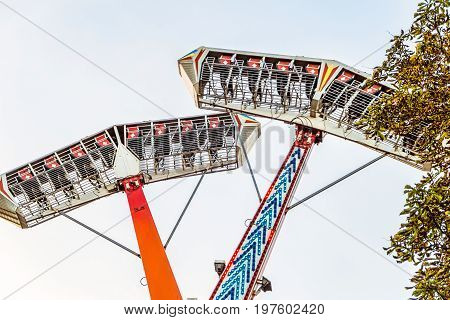 Extreme park attraction. Speed head over heels machine.