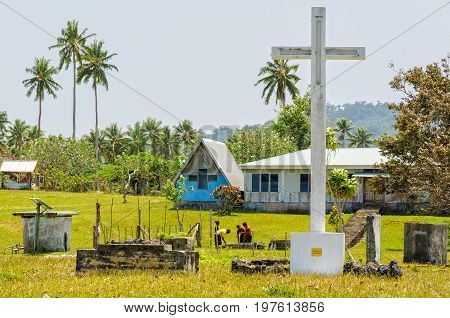 Gigantic white concrete cross at the northern end of Port Olry - Espiritu Santo, Vanuatu, 26 September 2012