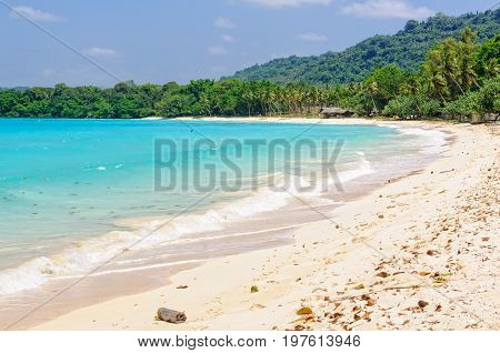 Sandy beach and turquoise water in the bay at Port Olry - Espiritu Santo, Vanuatu