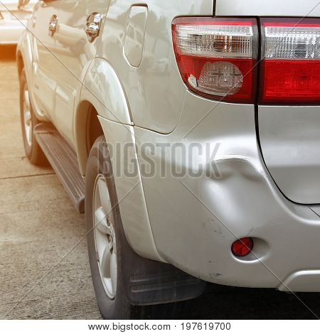 Vehicle Car Bumper Dent And Taillight Broken Collision Crash Damage Accident On Road