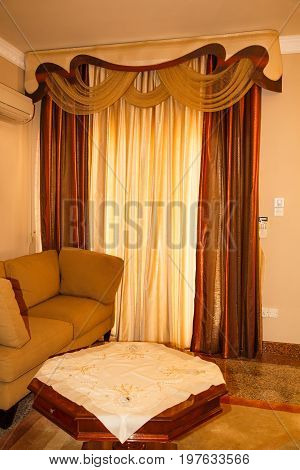 Brown and beige living room with luxurious design.