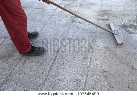 Install Polymeric Sand By Brooming