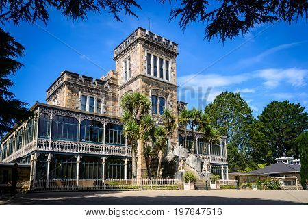 Larnach Castle framed by trees Dunedin New Zealand